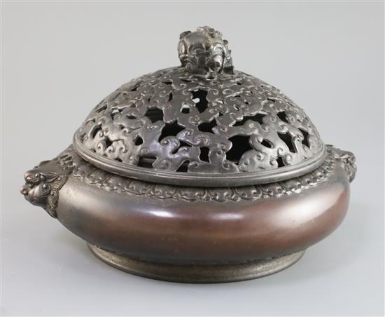 A large Chinese bronze censer, 17th/18th century with 16th/17th century bronze cover, W. 28cm